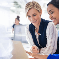 two girls working together