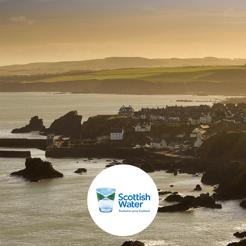 Golden sunset over coastal village.