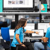 two people working together