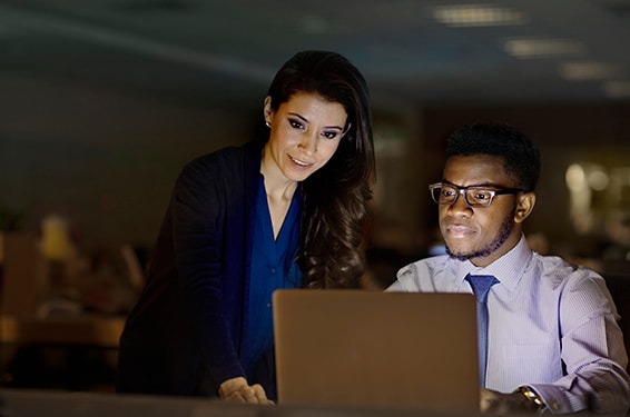 two people working together