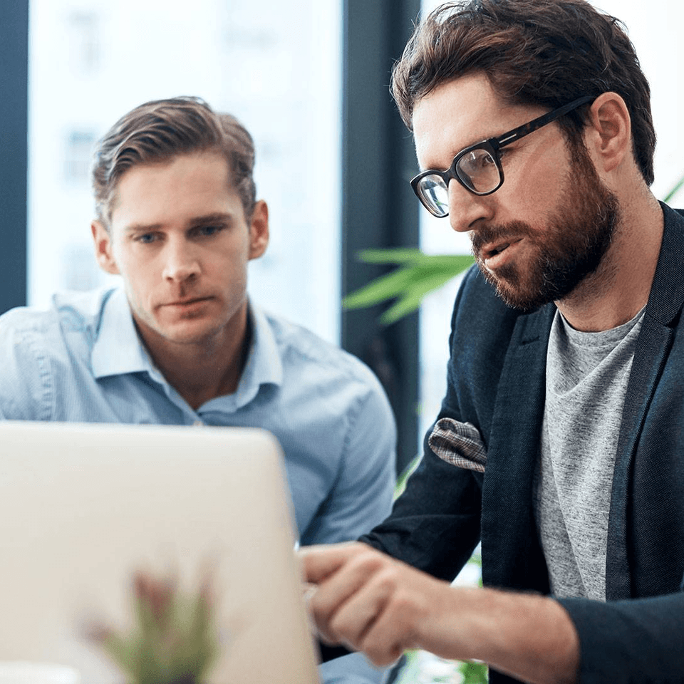 two men working together