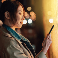 A woman looking at her phone