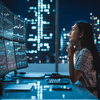 A woman looking at her monitor