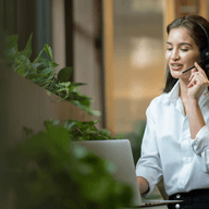 woman with headset talking