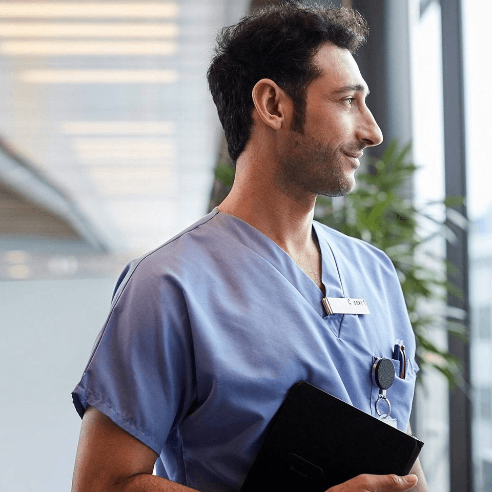 doctor looking at a window
