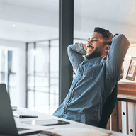 A man on his desk working
