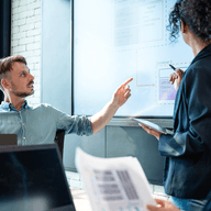 Two people in a meeting