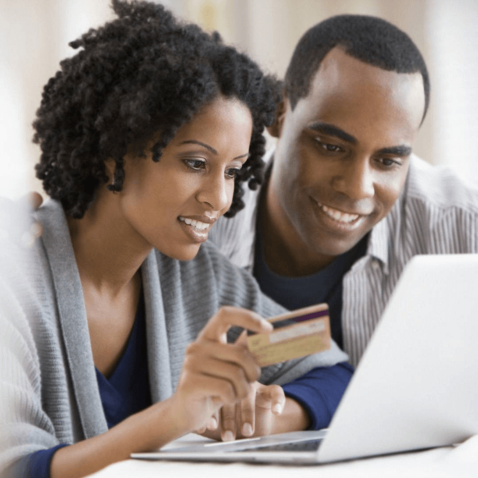 two people using a computer together