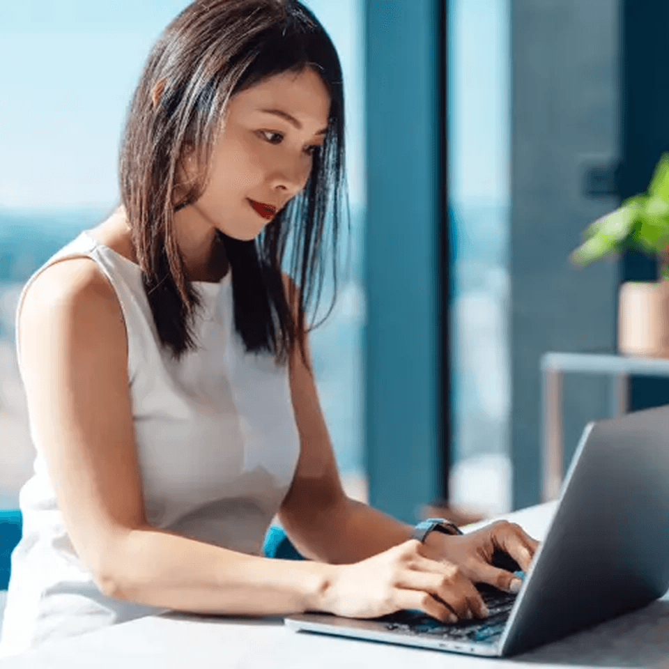 A woman working on her laptop