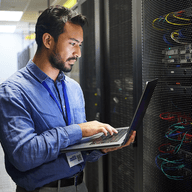 person working in a server room