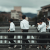 Bunch of young guys with uniform dress