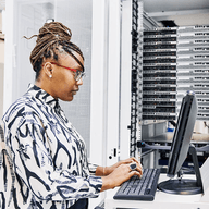 woman working in the office using her computer