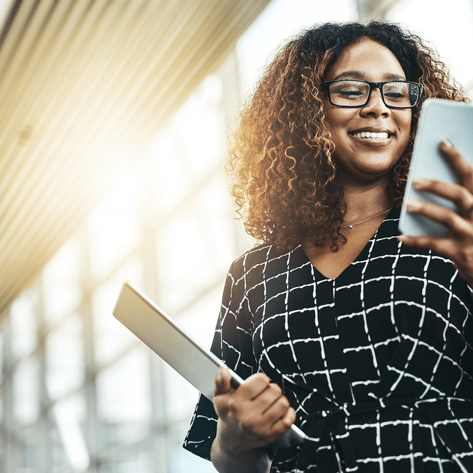 A woman looking at her phone