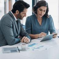 two workers calculating together