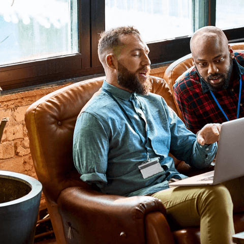 two men working together