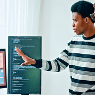 two software developers discussing