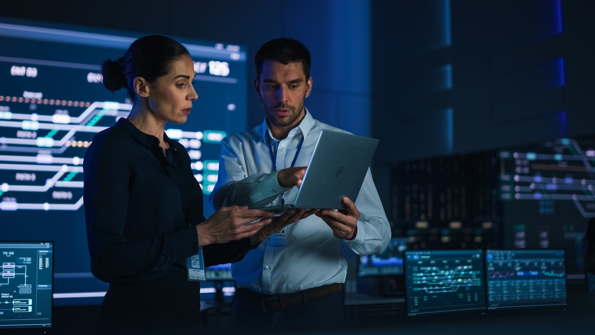 Engineers in server room