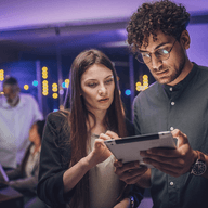 two people using a tablet